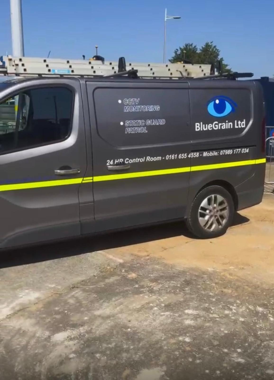 Bluegrain patrol van in Manchester livery, Bluegrain Ltd covering Oldham OL1 near Town Centre